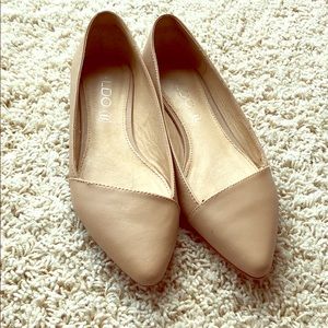Used Aldo bone color flats.